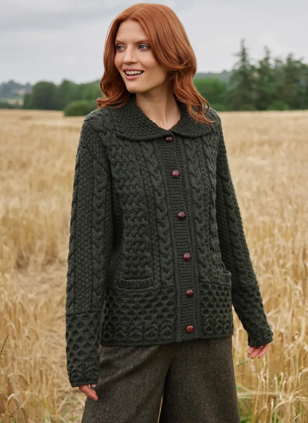 Jackie Aran Buttoned Cardigan in Army Green Basket Cable Stitch